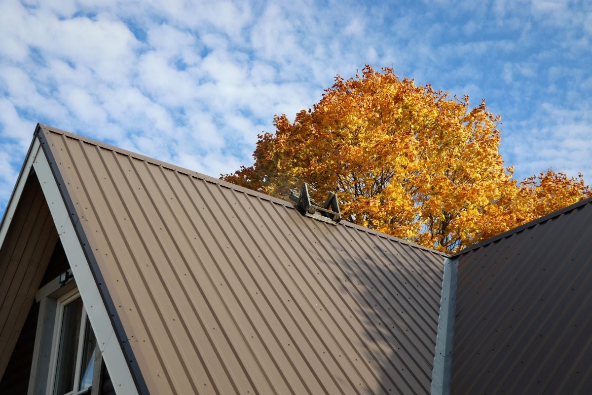 brown metal roof big modern house